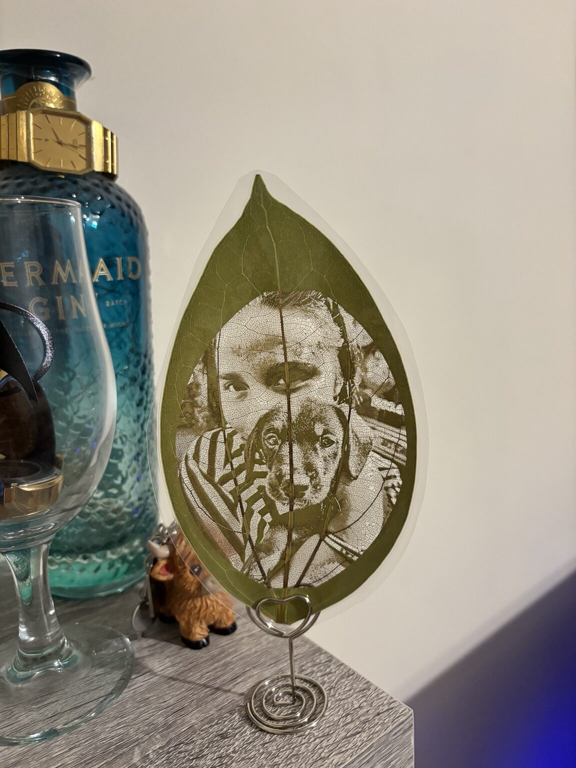 Photo portrait engraved onto a natural leaf